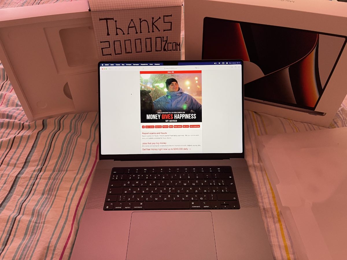 Free MacBook Pro giveaway free money from millionaires 2000004.com review